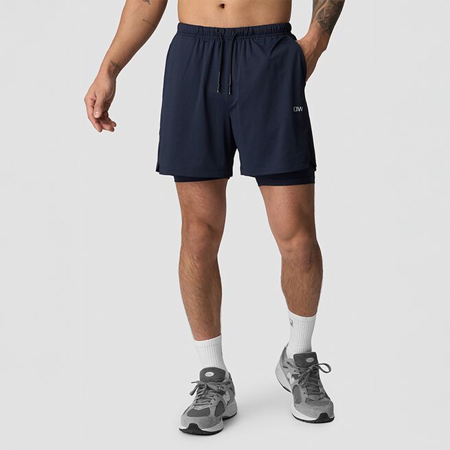 Stride Shortsit Tummansininen