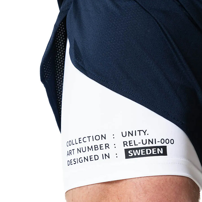 Unity Shorts Tummansininen