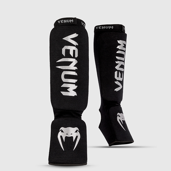 Kontact Säärisuojat Musta/Hopea