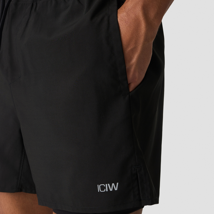 Workout 2-in-1 Shortsit 5 Tuumaa Musta